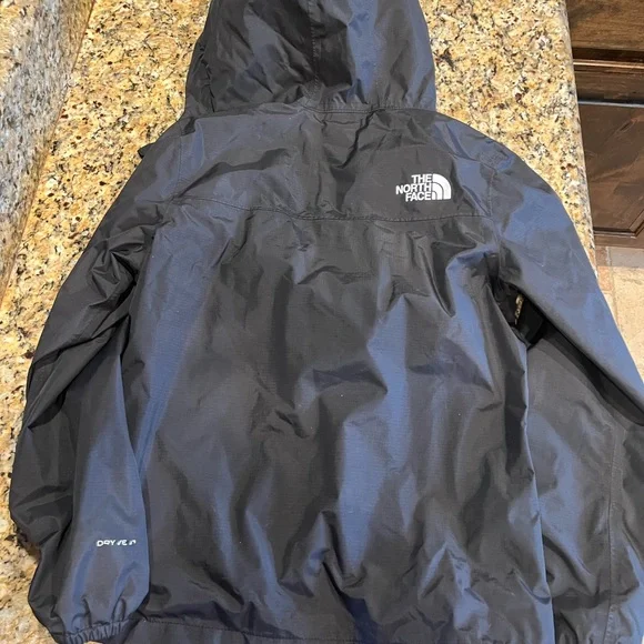 Little girls North Face wind breaker jacket size 10/12